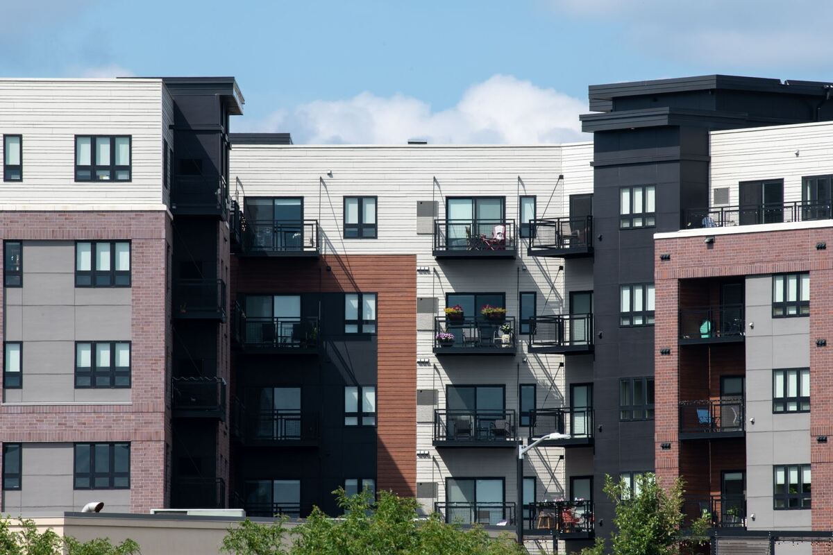 Newly built grey and white apartment buildings