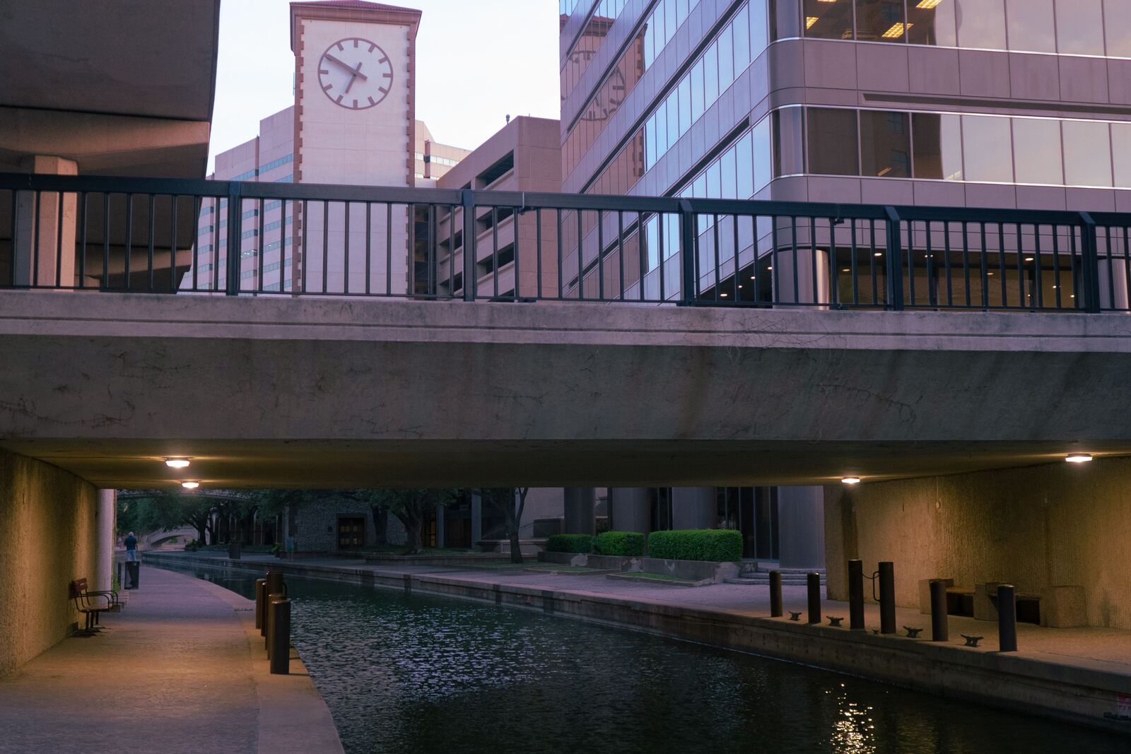Stone walkway passing beneath a bridge on the San Antonio River